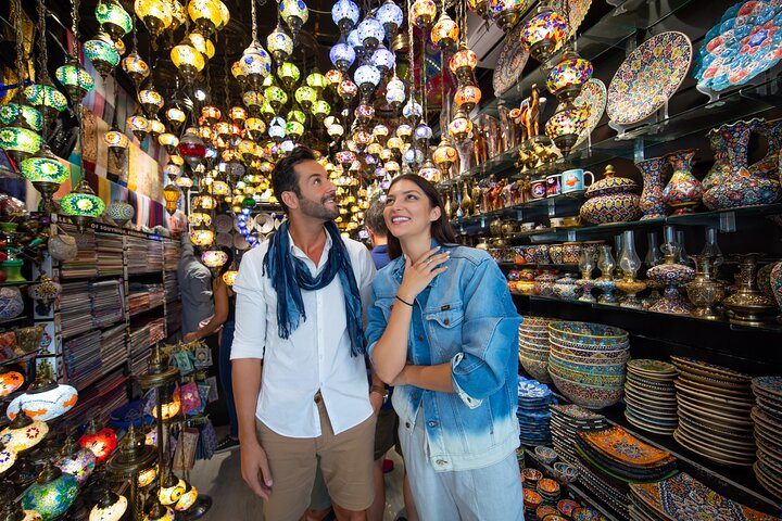 Explore the charming lanes of Dubai's local souks where stunning ceramics and exquisite lanterns create a delightful shopping experience perfect for finding unique treasures and engaging with friendly vendors.